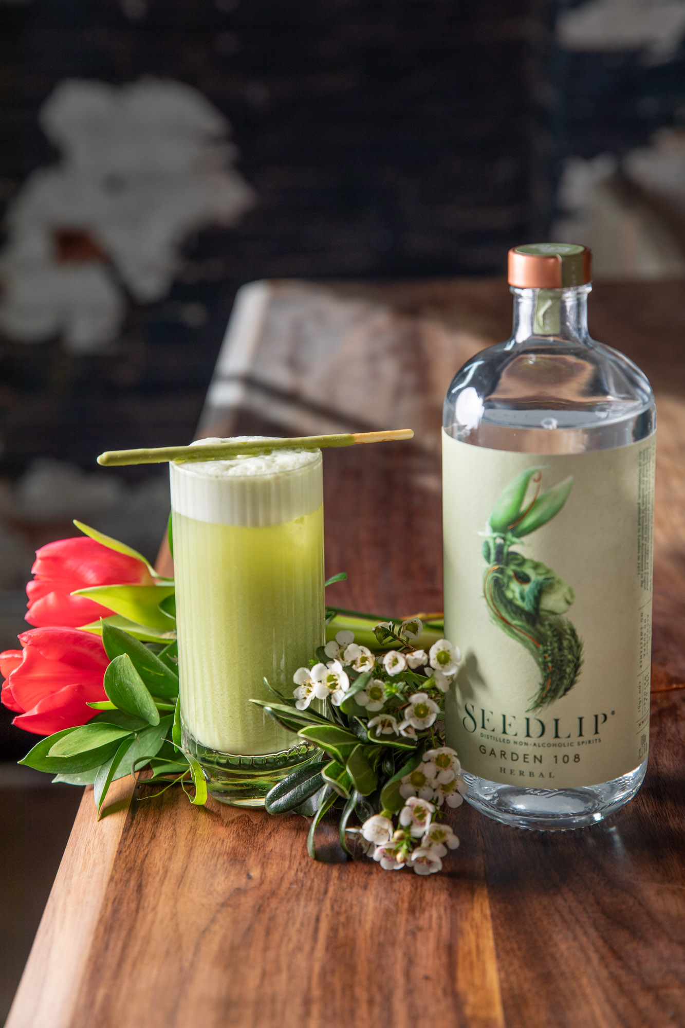 A natural cocktail surrounded by flowers