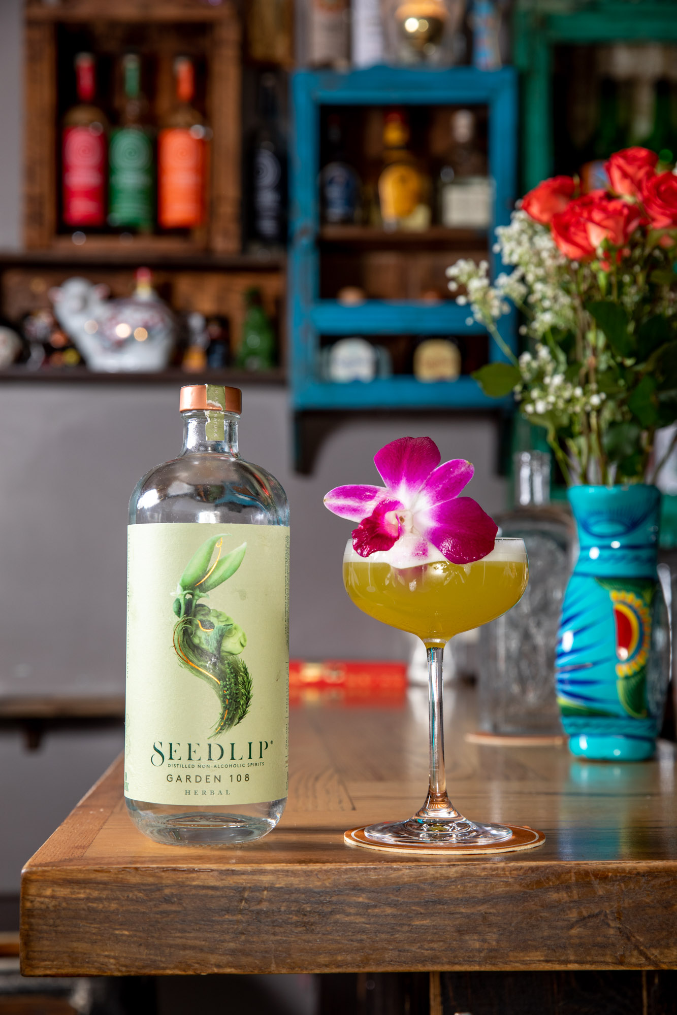 A drink garnished with a flower